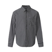Black and white checkered shirt on a white background