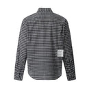Black and white checkered shirt on a white background