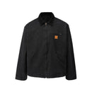 Black jacket with a brown patch on a white background