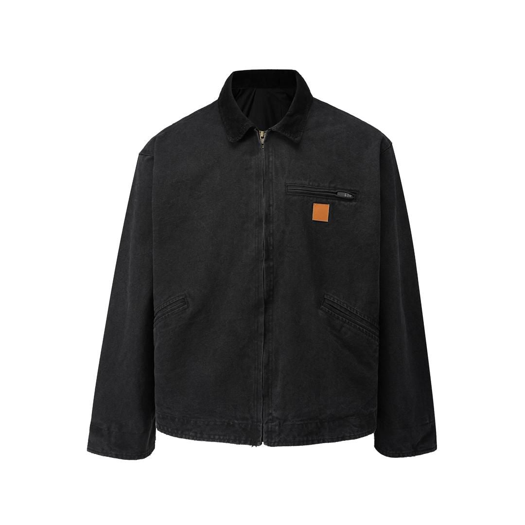 Black jacket with a brown patch on a white background