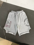 PATCHWORK GREY SHORTS