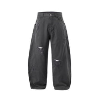 Dark gray pants with distressed details on a white background