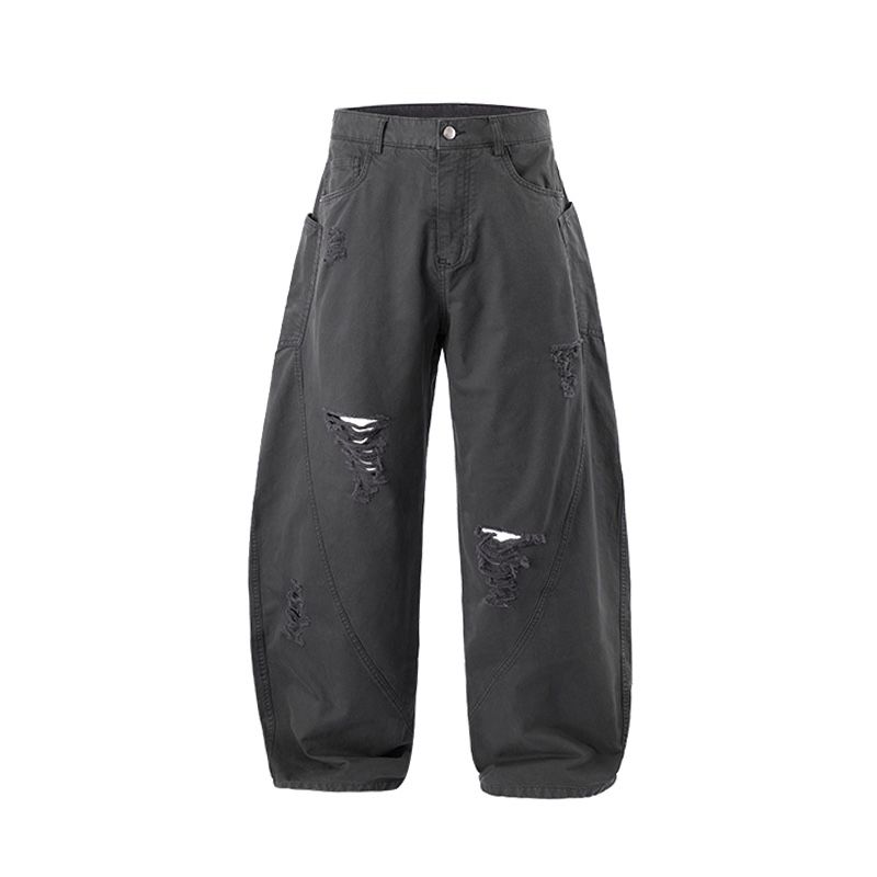 Dark gray pants with distressed details on a white background