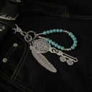 MYSTIC KEY AND FEATHER CHARM