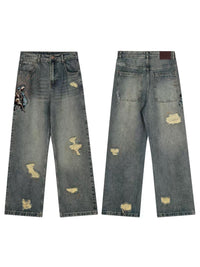 BLUE WASHED RIPPED JEANS