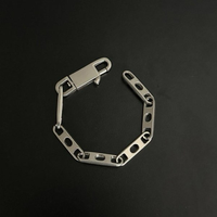 POCKET CHAIN PIN HOLES