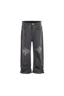 COMET CUTS STONED BLACK JEANS