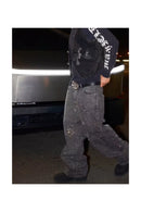 COMET CUTS STONED BLACK JEANS