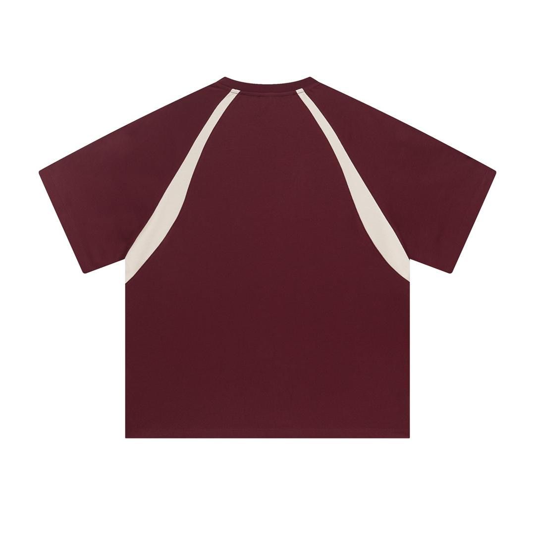 Maroon t-shirt with white accents on a white background