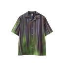 Striped shirt with green and purple pattern on a white background