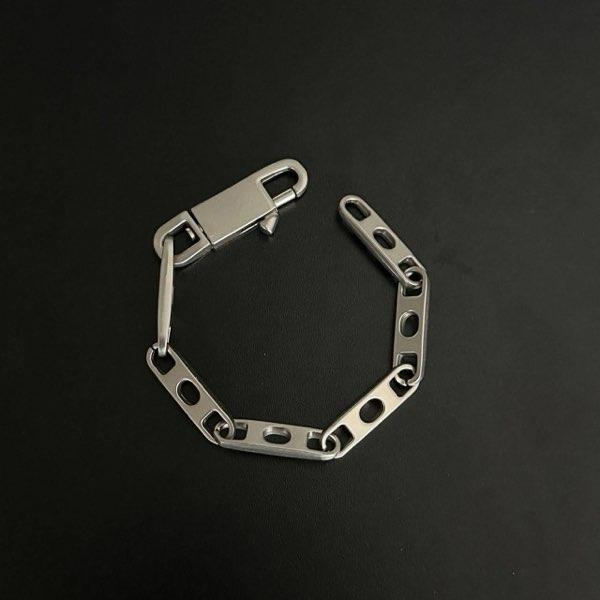 POCKET CHAIN PIN HOLES