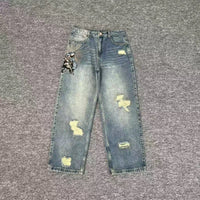 BLUE WASHED RIPPED JEANS